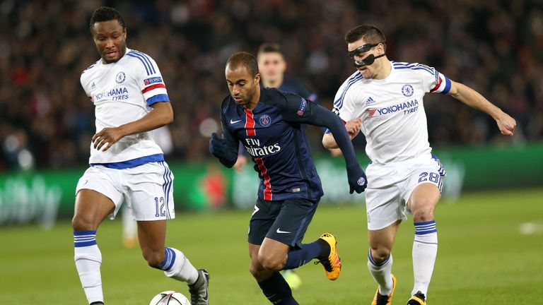 Paris Saint-Germain's Lucas Moura (centre) in action with Chelsea's John Obi Mikel (left) and Cesar Azpilicueta, Champions League