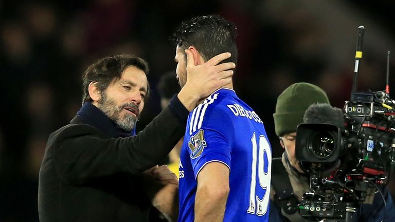 Watford manager Quique Sanchez Flores chats with Chelsea's Diego Costa