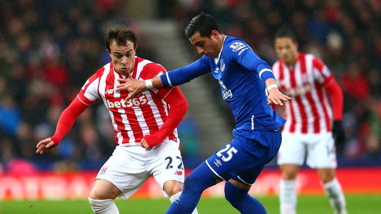 Ramiro Funes Mori of Everton and Xherdan Shaqiri of Stoke City compete for the ball