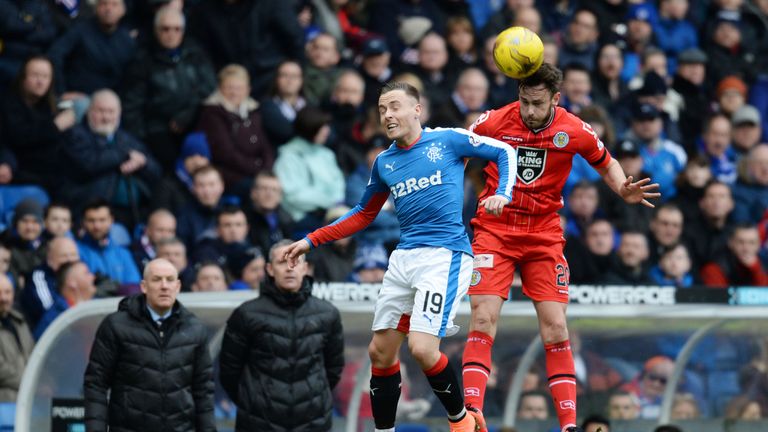 Rangers' Barrie McKay (left) goes in for the aerial challenge against St Mirren's Keith Watson 
