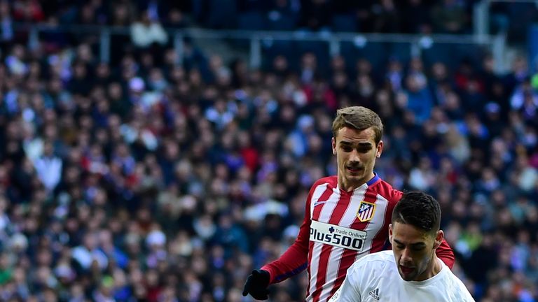 Augusto (left) puts in another challenge at Bernabeu