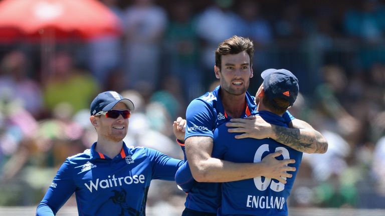 PORT ELIZABETH, SOUTH AFRICA - FEBRUARY 06:  Reece Topley of England celebrates with England captain Eoin Morgan and Jos Buttler after dismissing JP Duminy