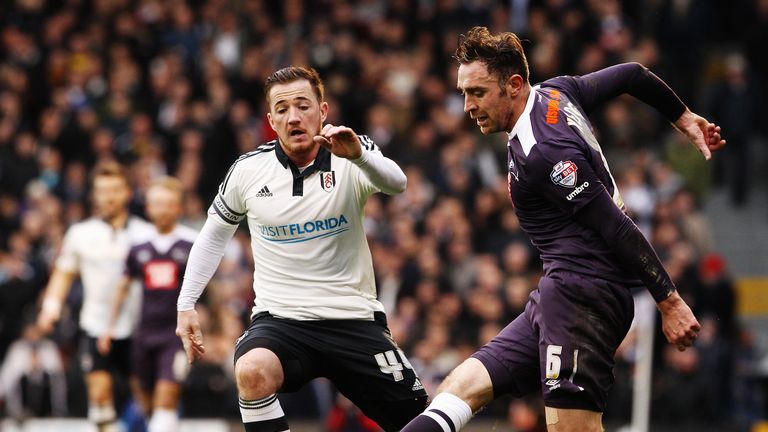 Richard Keogh holds off the challenge of Ross McCormack 