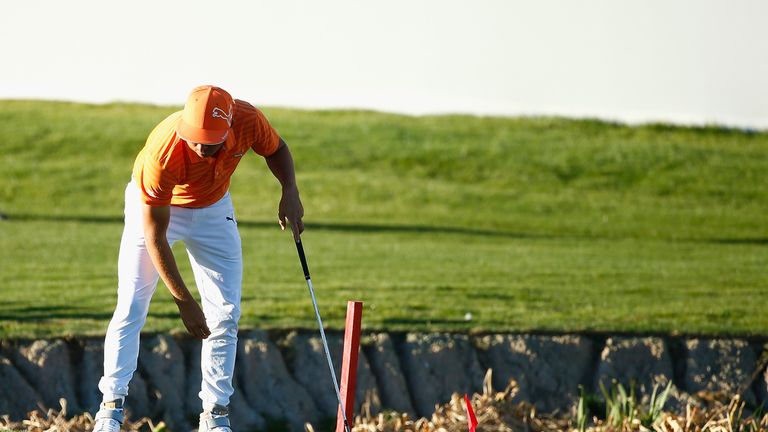 Rickie Fowler drove his ball in to the water on the fourth play-off hole, for the second time in an hour 