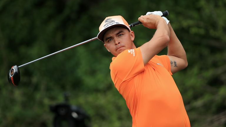 Rickie Fowler of the United States hits his tee shot on the third hole during the final round of the Honda Classic