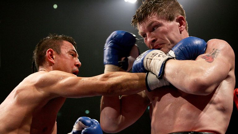 Ricky Hatton ties up Tszyu during the biggest night of his career