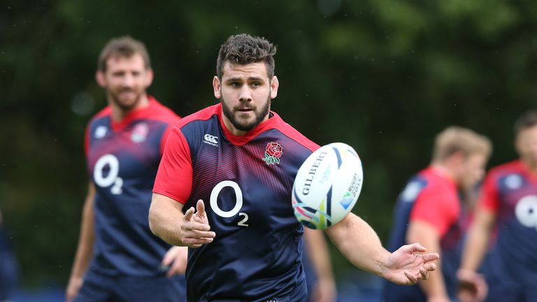 Rob Webber passes the ball during the England training session at Pennyhill Park 