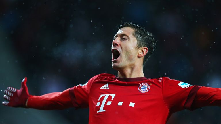 AUGSBURG, GERMANY - FEBRUARY 14:  Robert Lewandowski of Bayern Munich celebrates as he scores 