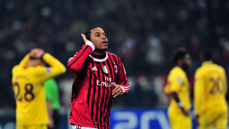 AC Milan's Brazilian forward Robinho celebrates after scoring during the UEFA Champions League round of 16 first leg match AC Milan vs Arsenal at San Siro 