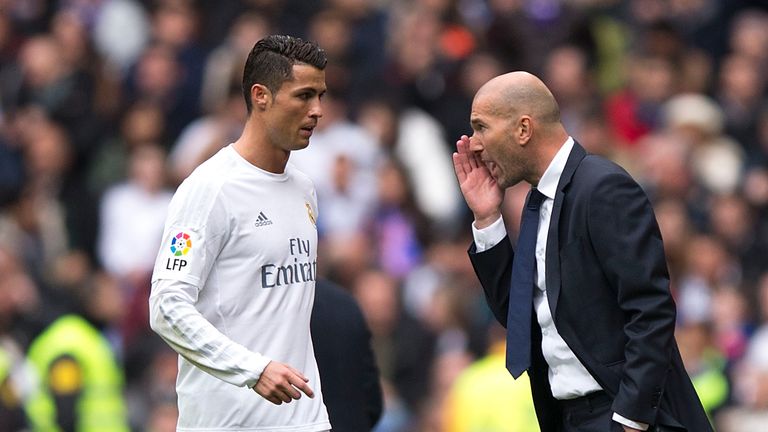 Zinedine Zidane (right) gives instructions to Ronaldo