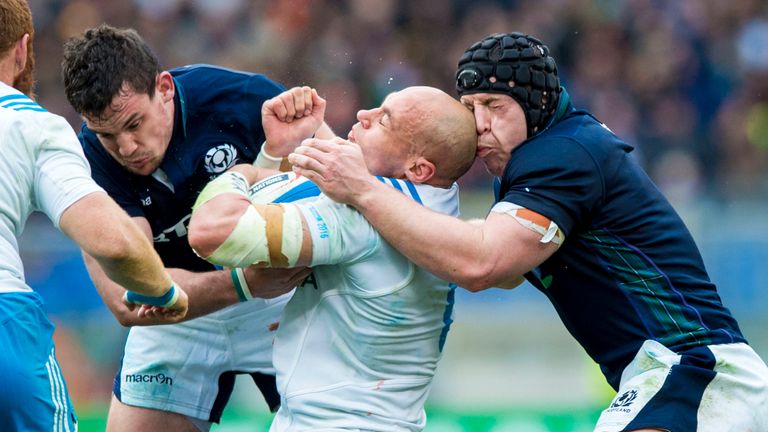 Scotland pair John Hardie (left) and Alasdair Dickinson battle with Sergio Parisse