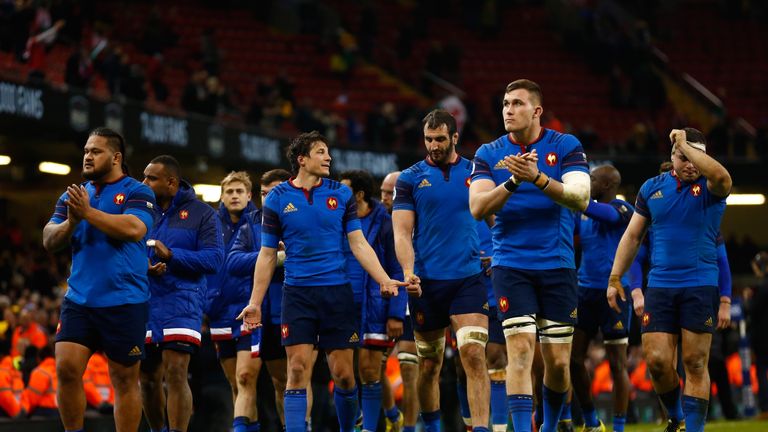 Dejected France players applaud the fans following their Six Nations defeat to Wales