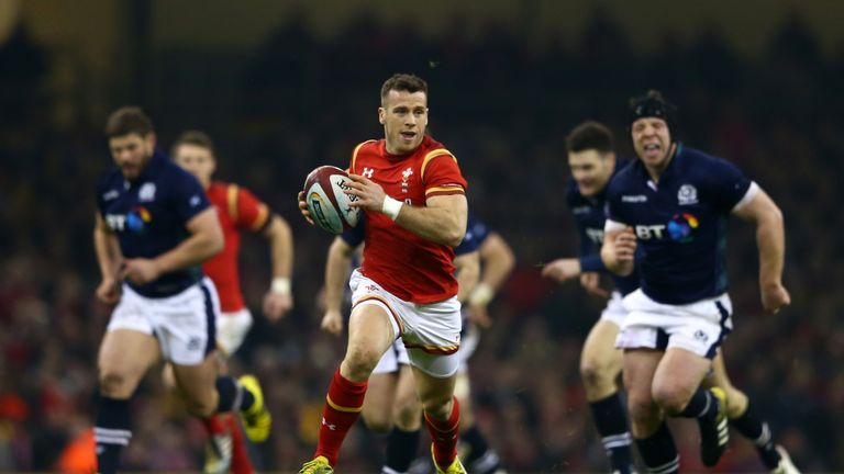 Wales scrum-half Gareth Davies breaks away to score the opening try against Scotland