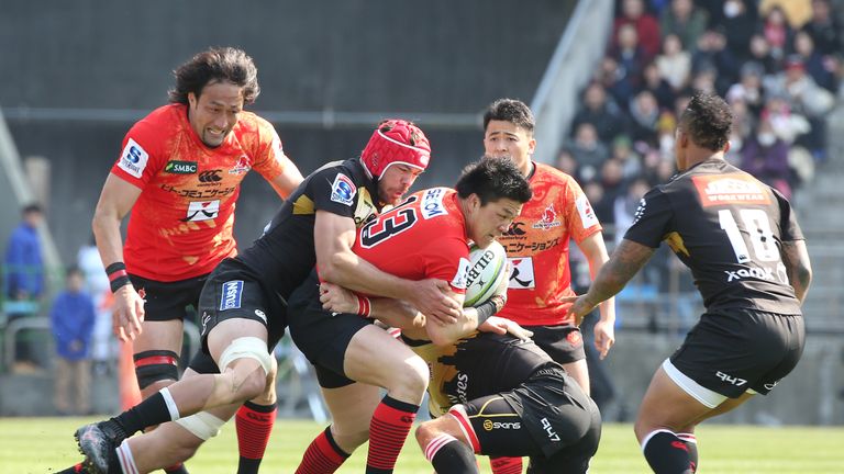 Harumichi Tatekawa of the Sunwolves is tackled during their defeat to the Lions