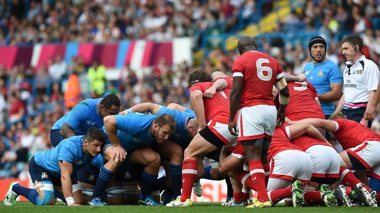 Italy and Canada prepare for a scrum at the Rugby World Cup