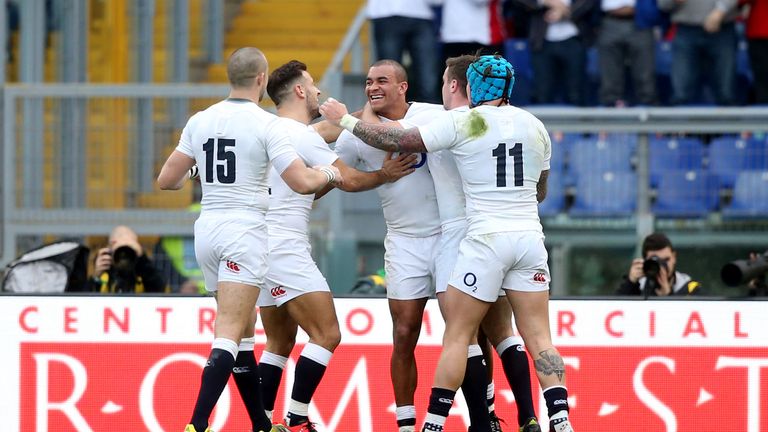 England's Jonathan Joseph is congratulated after scoring his second try against Italy