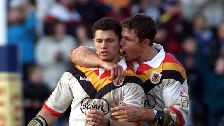 Bradford Bulls' Henry Paul (left) celebrates his match-winning drop goal against St Helens with team mate Stuart Fielden on the opening day of 2001 season