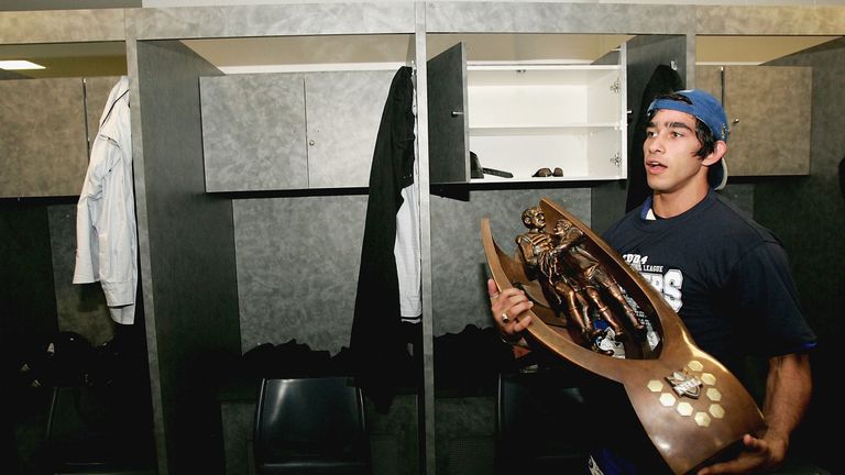 Johnathan Thurston carries the trophy after Canterbury Bulldogs' Grand Final victory in 2004