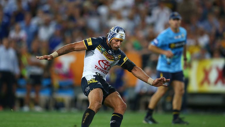 Johnathan Thurston kicks the winning drop goal in North Queensland Cowboys' Grand Final win over Brisbane in 2015