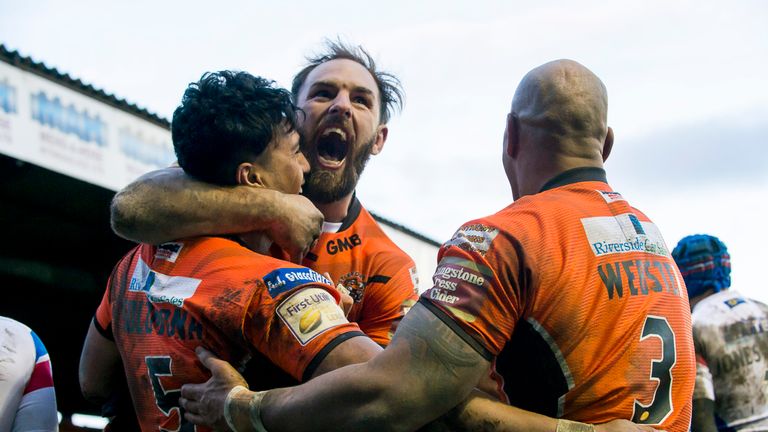 Castleford's Luke Gale (c) celebrates with team-mates Denny Solomona and Jake Webster