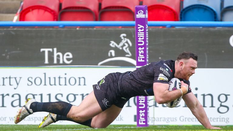 Widnes' Stefan Marsh scores one of his two tries against Huddersfield