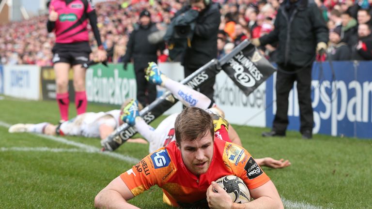 Scarlets full-back Michael Collins scores his second try against Ulstern