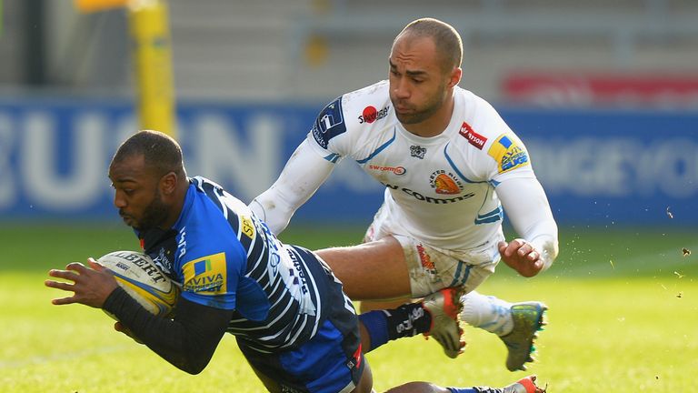 Neville Edwards of Sale Sharks tackled by Olly Woodburn  of  Exeter Chiefs