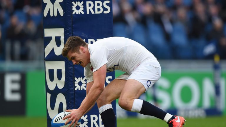 Owen Farrell of England runs in his team's fifth try against Italy