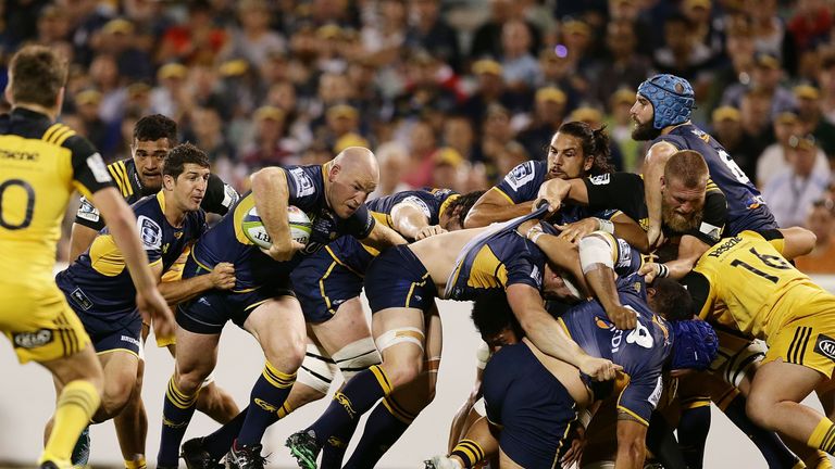 Brumbies captain Stephen Moore peels off the back of a rolling maul to score a try against the Hurricanes