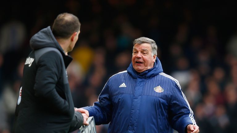 Sam Allardyce of Sunderland talks to the fourth official Michael Jones during the Premier League match between West Ham United and Sunderland