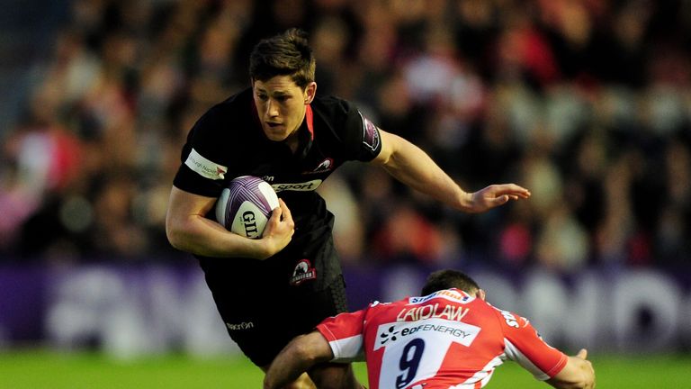Sam Beard of Edinburgh is tackled by Greig Laidlaw of Gloucester