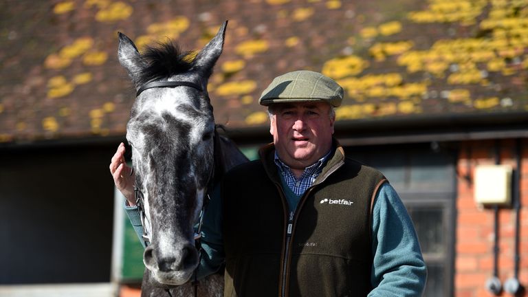 Trainer Paul Nicholls stands alongside Saphir Du Rheu during a stable visit to Paul Nicholls' stables at manor Farm Stables, Ditcheat. PRESS ASSOCIATION Ph
