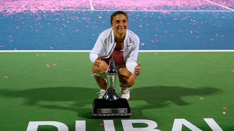 Sara Errani of Italy shows of the trophy in Dubai