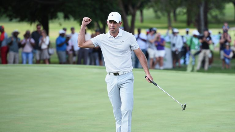PRETORIA, SOUTH AFRICA - FEBRUARY 14:  Charl Schwartzel of South Africa celebrates victory on the 18th green during the final round of the Tshwane Open at 