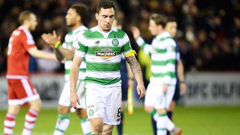 Celtic skipper Scott Brown looks dejected after the defeat at Aberdeen
