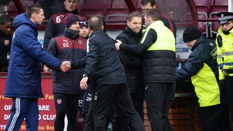 Robbie Neilson and Alan Stubbs shake hands at the end