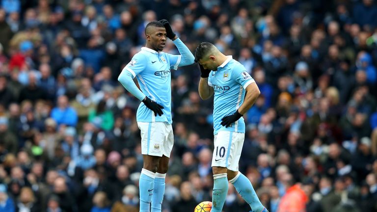 Kelechi Iheanacho (L) and Sergio Aguero (R) of Manchester City show their frustration