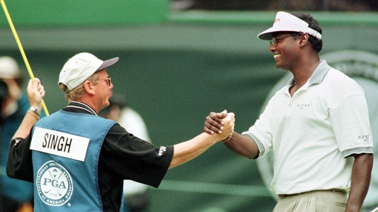 Vijay Singh celebrates with caddie Dave Renwick after PGA glory in 1998