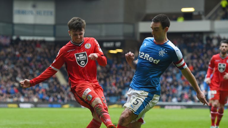 St Mirren's Calum Gallagher (left) battles for the ball against Rangers' Lee Wallace 