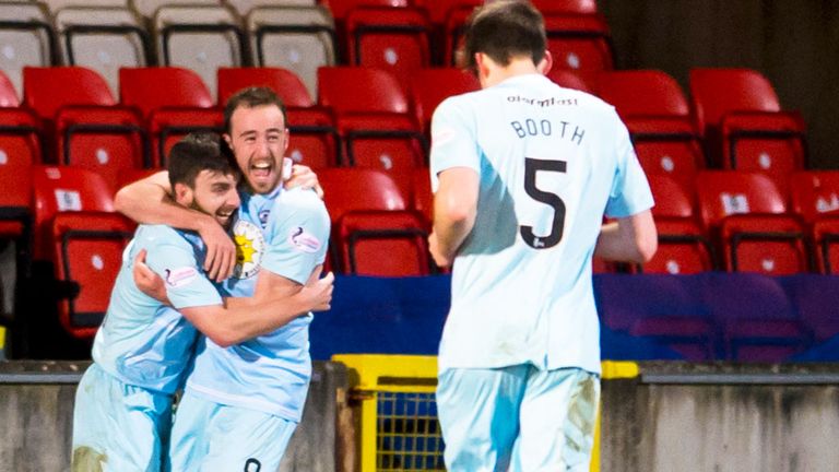 Steven Lawless (left) celebrates his goal for Partick against Motherwell