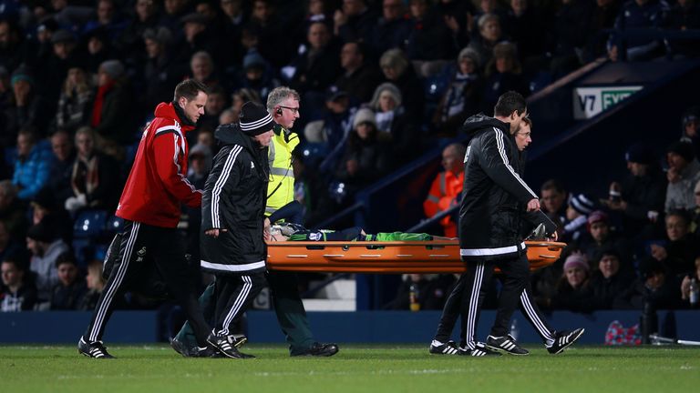 Swansea City's Sung-Yueng Ki is stretchered off during the Barclays Premier League match at The Hawthorns, West Bromwich.