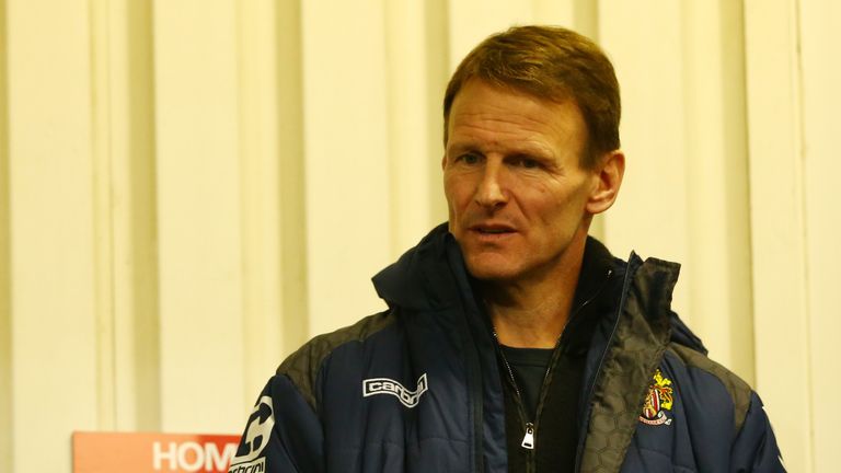 Teddy Sheringham the player manager of Stevenage looks on