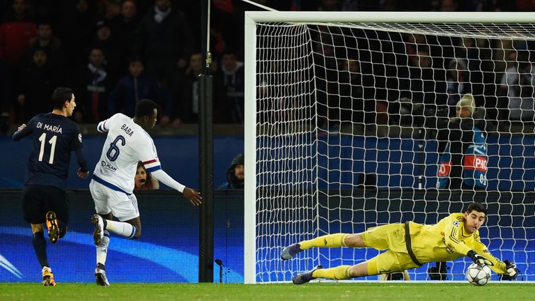 Thibaut Courtois saves from Angel Di Maria of Paris St Germain as Baba Rahman of Chelsea look on in the Champions League tie in Paris in February 2016