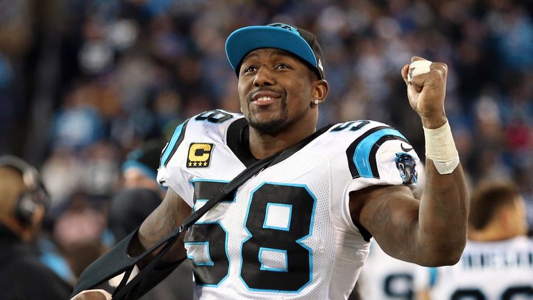 An injured Thomas Davis celebrates in the fourth quarter against the Arizona Cardinals