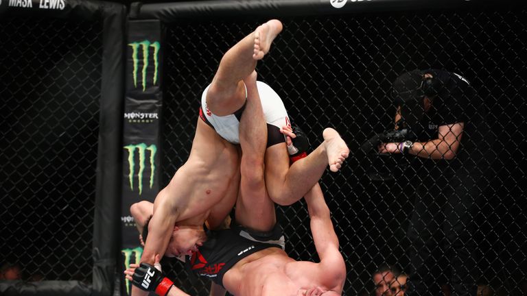 Tom Breese of England (Black shorts) in action as he beats Keita Nakamura of Japan during the Welterweight Bout of the UFC 