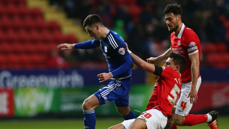 Tom Lawrence of Cardiff is fouled by Jorge Teixeira of Charlton