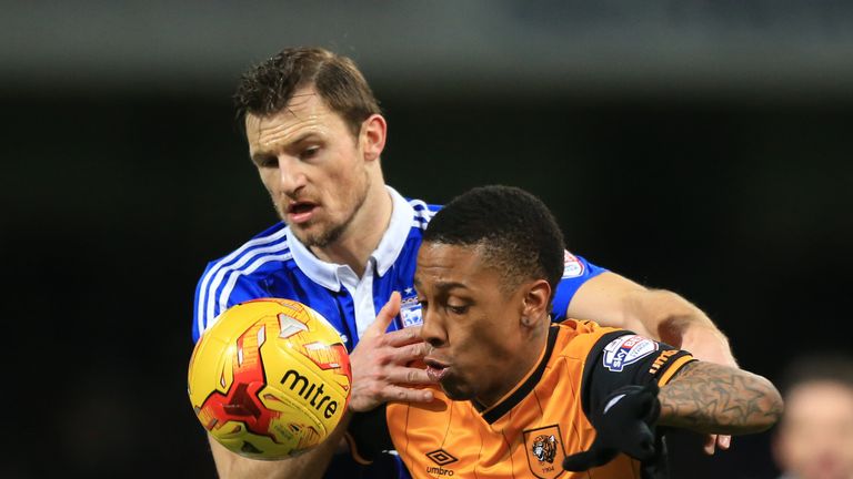 Ipswich Town's Tommy Smith (left) and Hull City's Abel Hernandez battle for the ball during the Sky Bet Championship match at Portman Road, Ipswich.