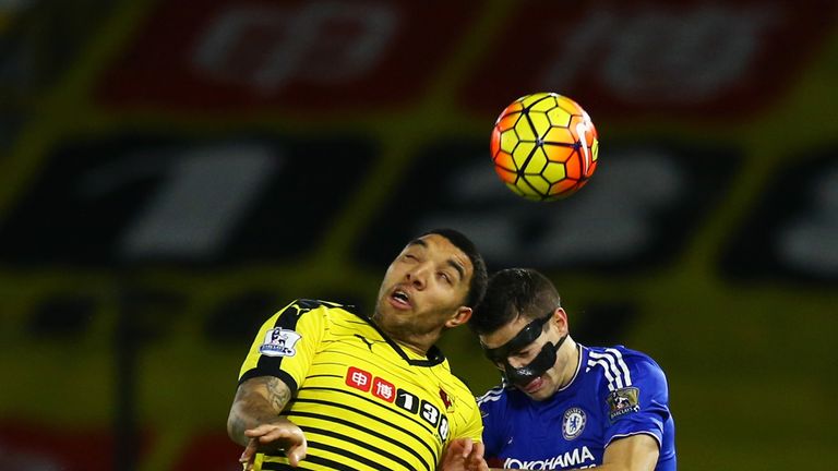 Troy Deeney of Watford and Cesar Azpilicueta of Chelsea compete for a header