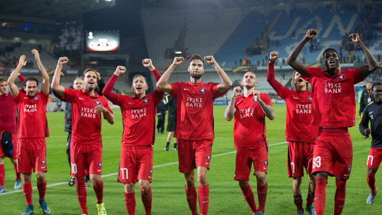 Midtjylland's players celebrate after winning the UEFA Europa League group D football match against Club Brugge on October 1, 2015 in Brugge