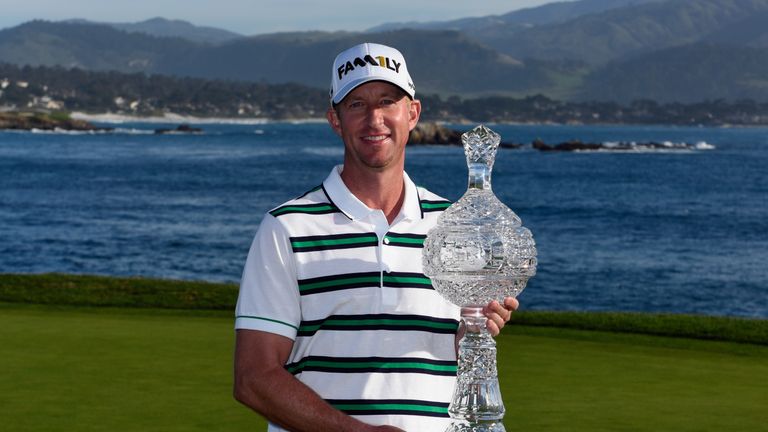  Vaughn Taylor poses with the trophy after winning the AT&T Pebble Beach National Pro-Am 